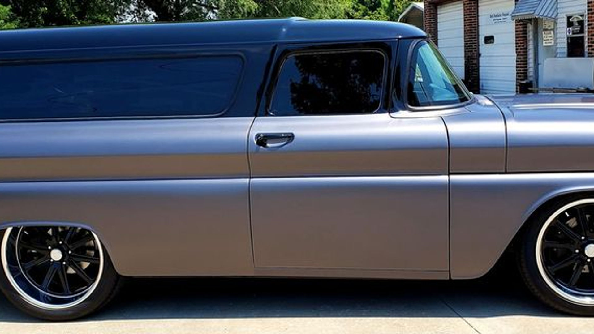 Silver custom Chevy panel delivery