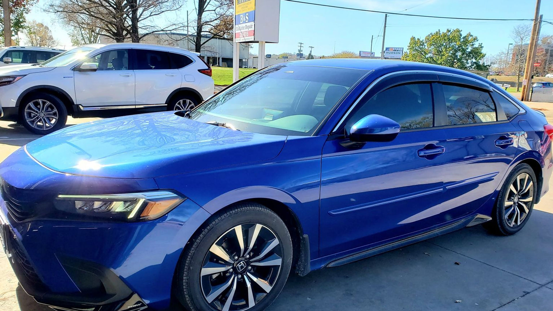 Blue Honda Civic with tinted windows